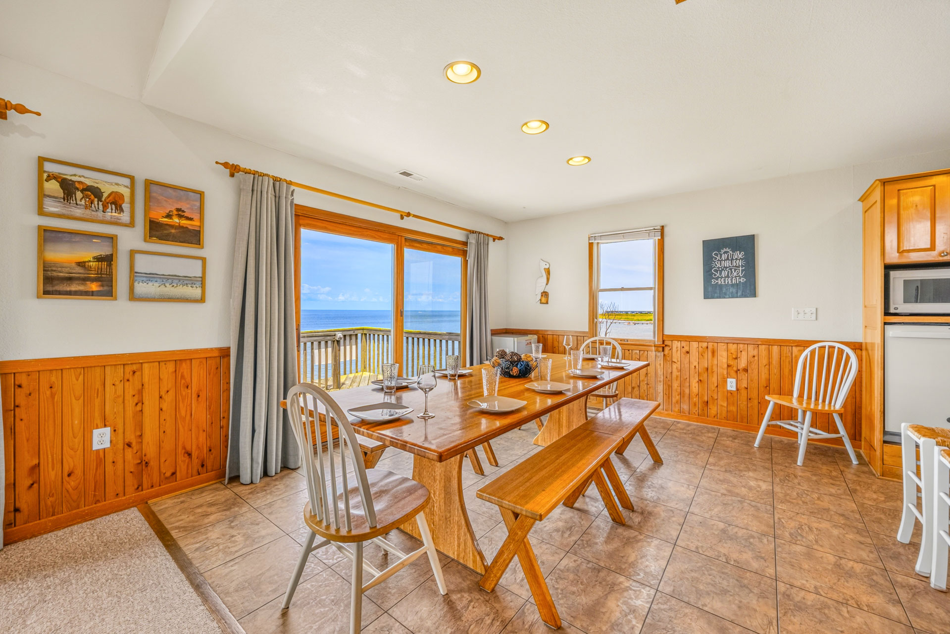 Surf Or Sound Realty 165 Against The Wind Dining Area 1