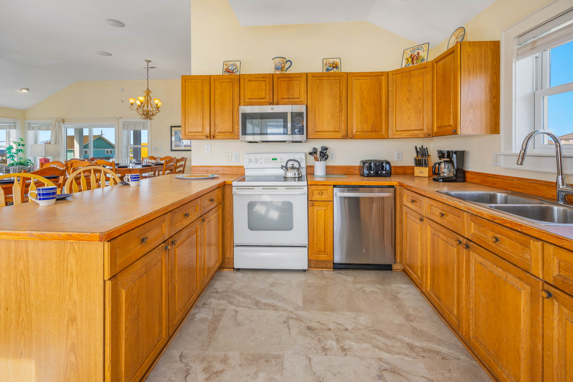 Surf Or Sound Realty 595 Tropical Paradise Kitchen 2