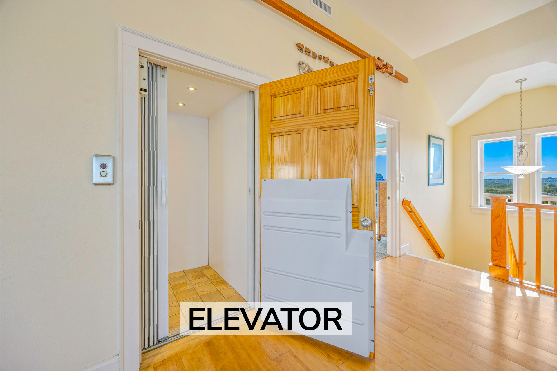 Surf Or Sound Realty 499 Jamaican Me Happy Elevator Label