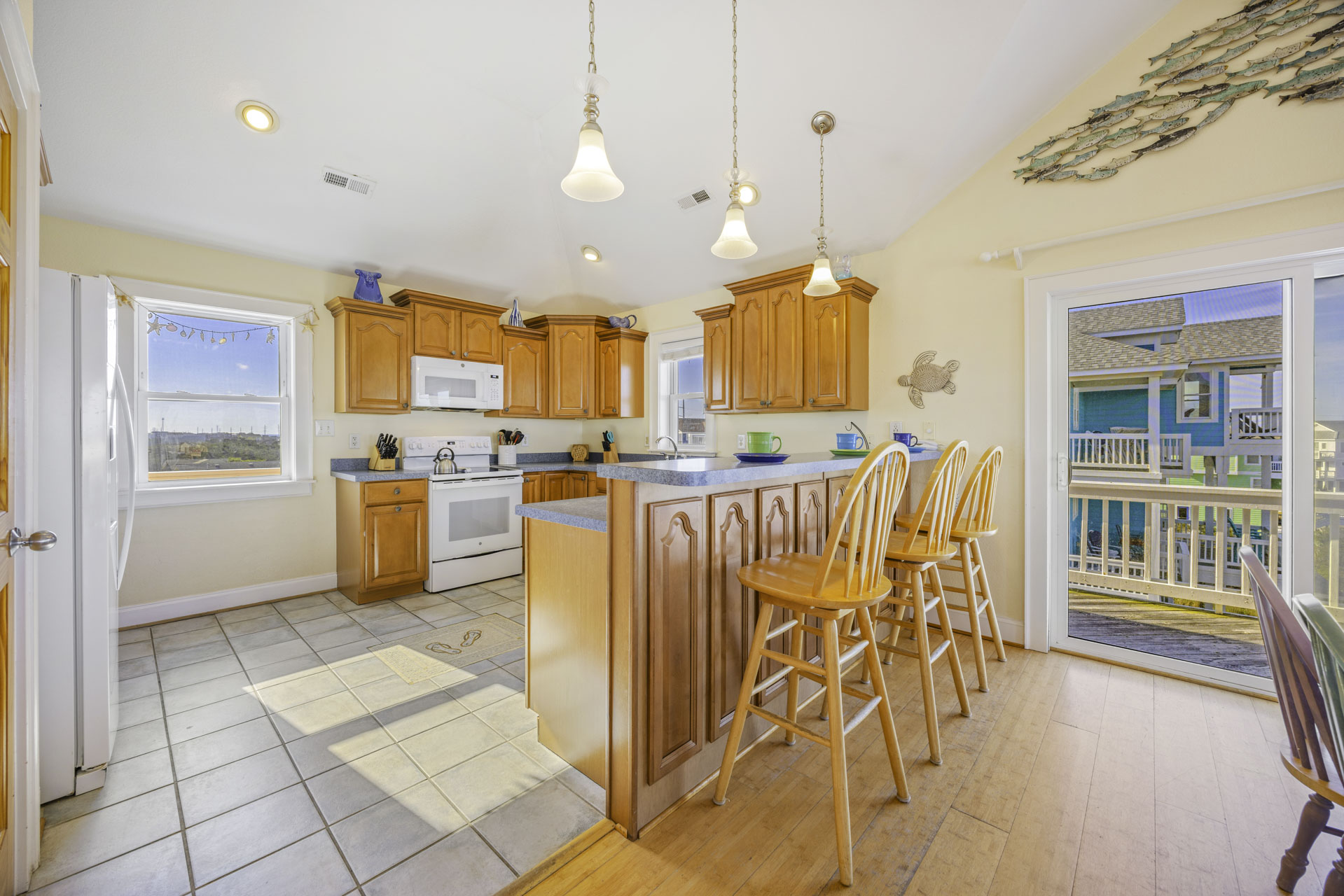 Surf Or Sound Realty 499 Jamaican Me Happy Kitchen 1