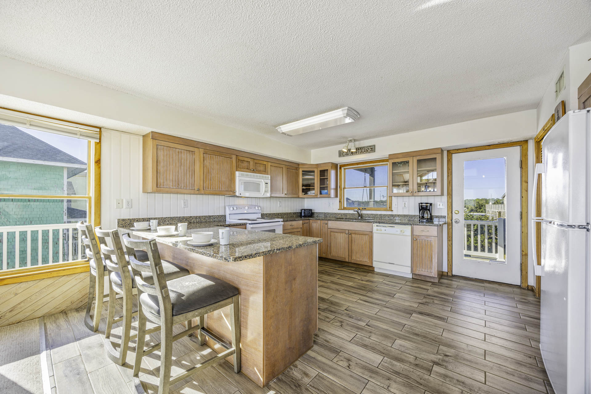 Surf Or Sound Realty 828 Peaceful Easy Feeling Kitchen 1