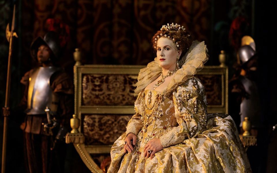 Queen Elizabeth in her full regalia near her thrown, on the set of The Lost Colony at the Fort Raleigh National Historic Site