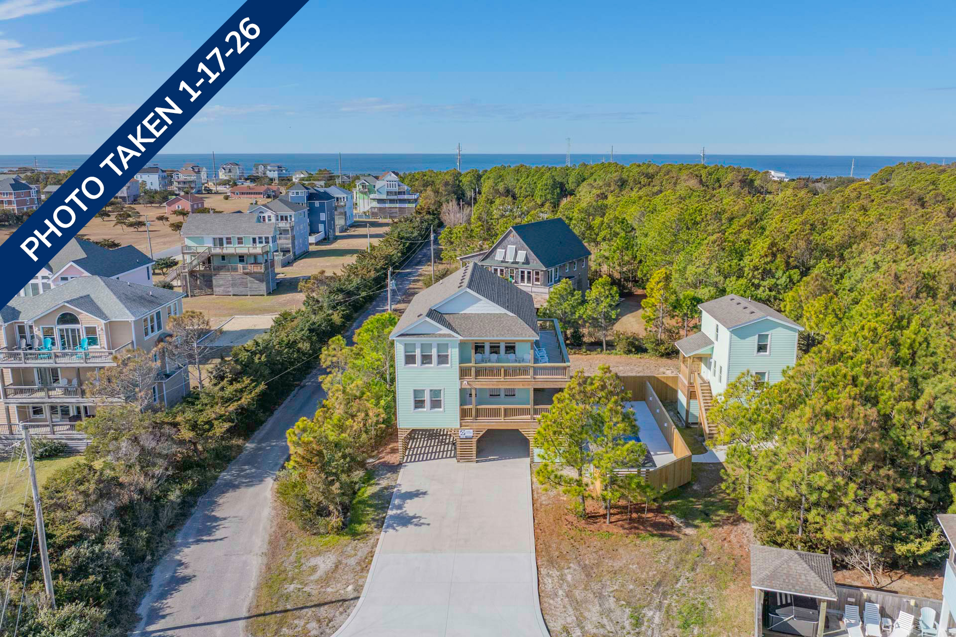 Surf Or Sound Realty 1240 Coastal Breeze Exterior 6 Date