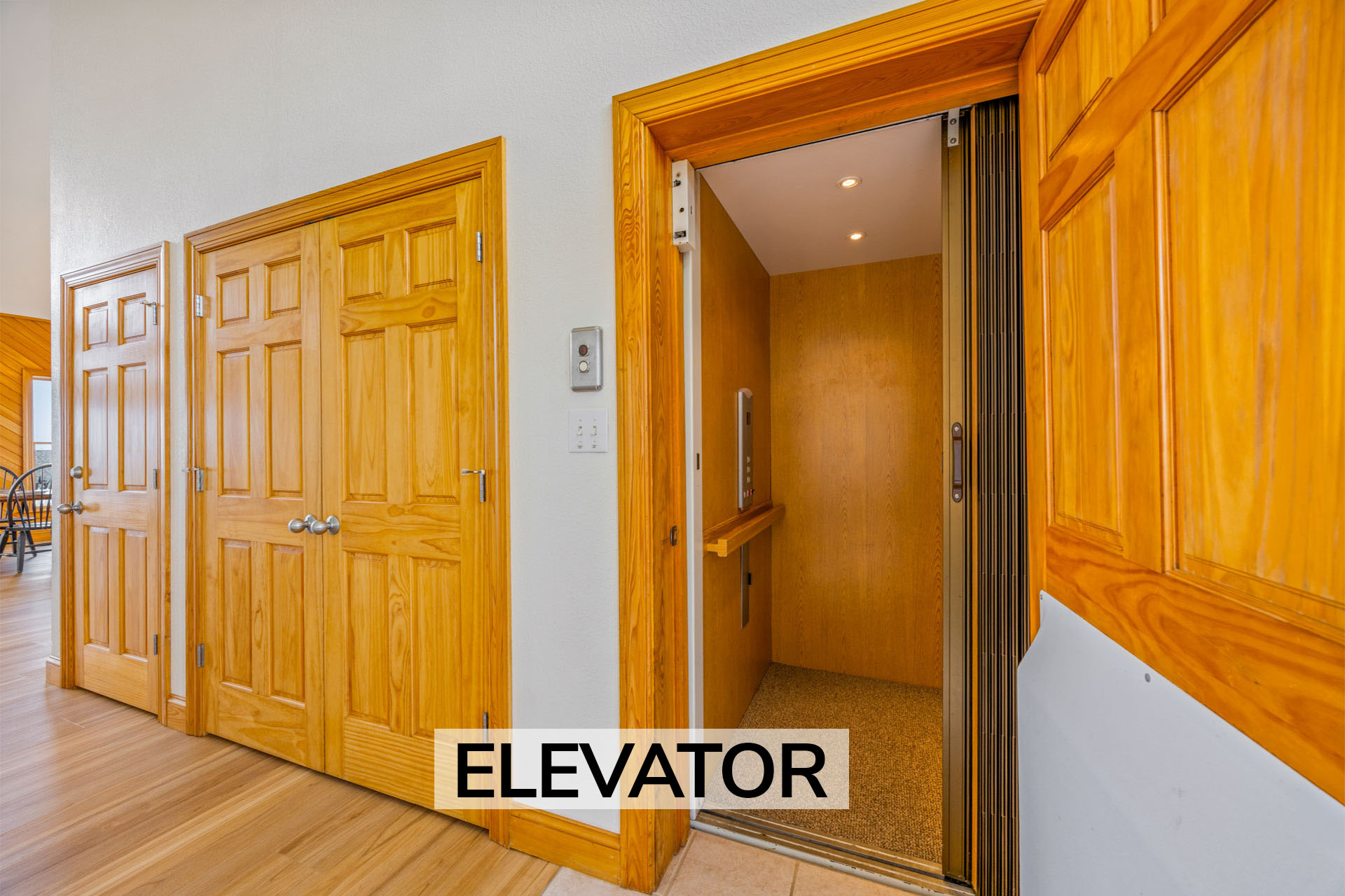 Surf Or Sound Realty 1251 Whispering Sands Elevator Label