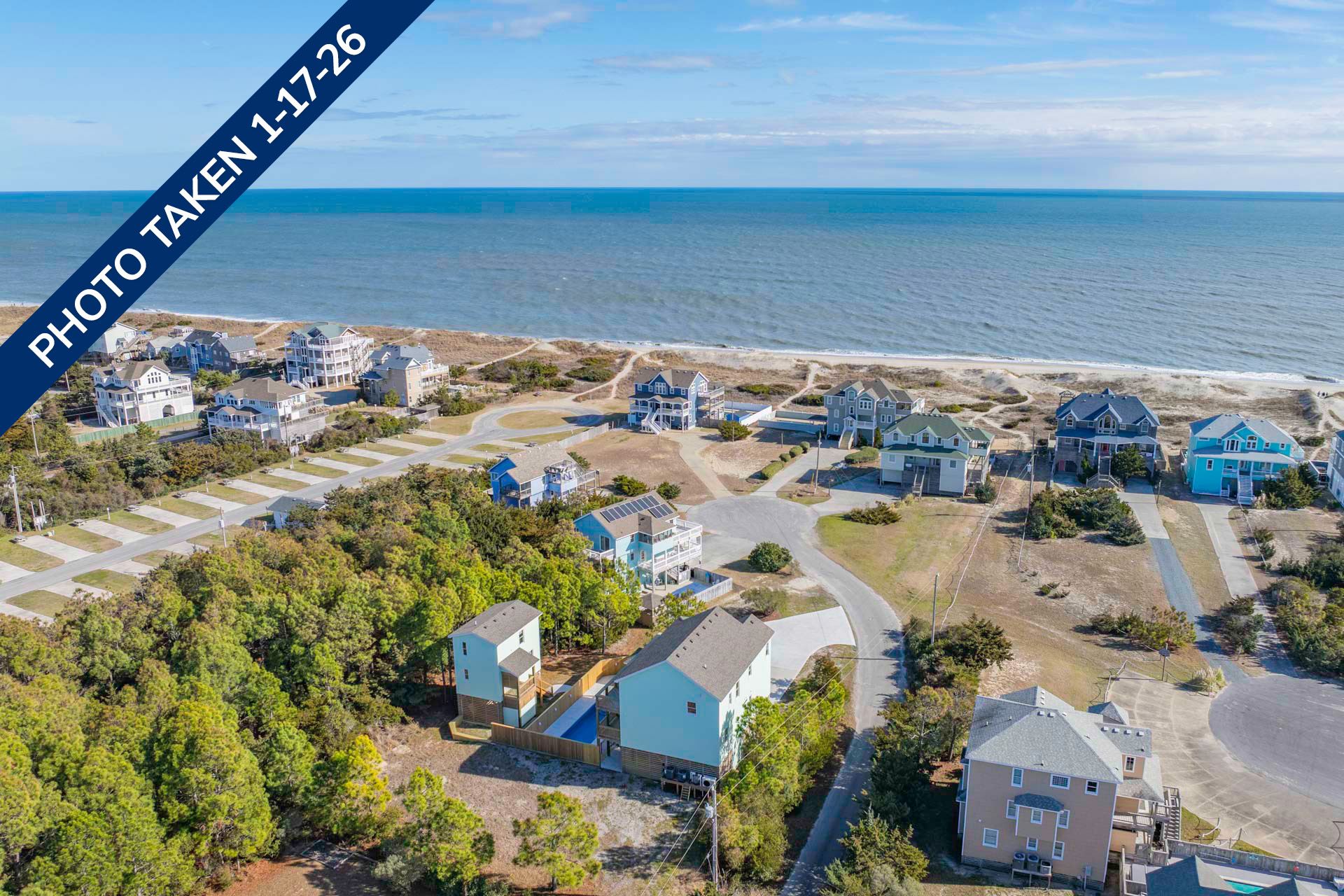 Surf Or Sound Realty 1240 Coastal Breeze Exterior 9 Date