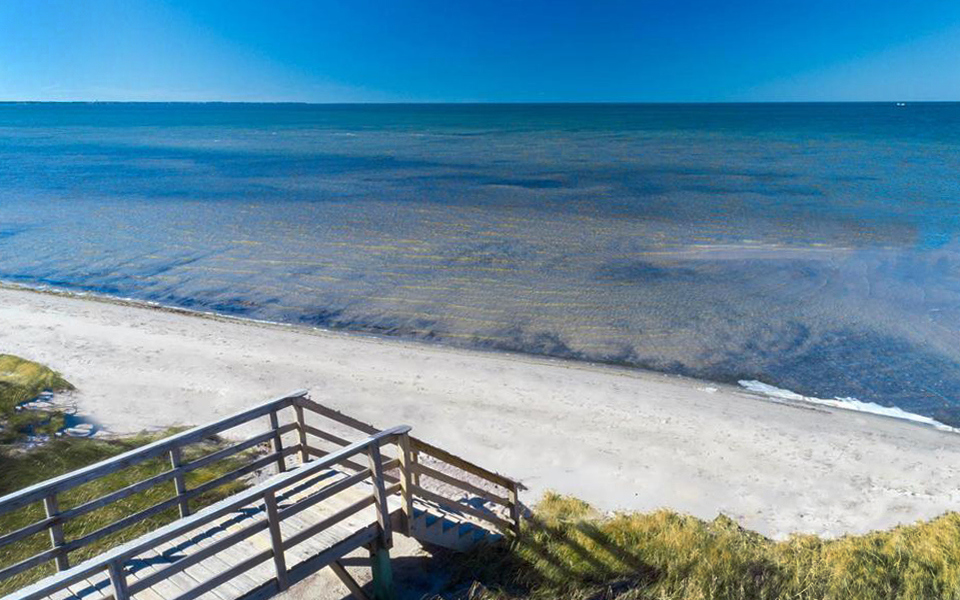 Walkover leading to the white sand beach of the soundside Haulover Day Use Area between Frisco and Hatteras Village