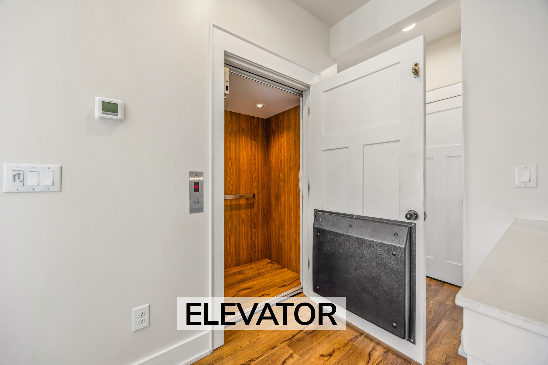 Surf Or Sound Realty 862 Perfect 10 Elevator Label
