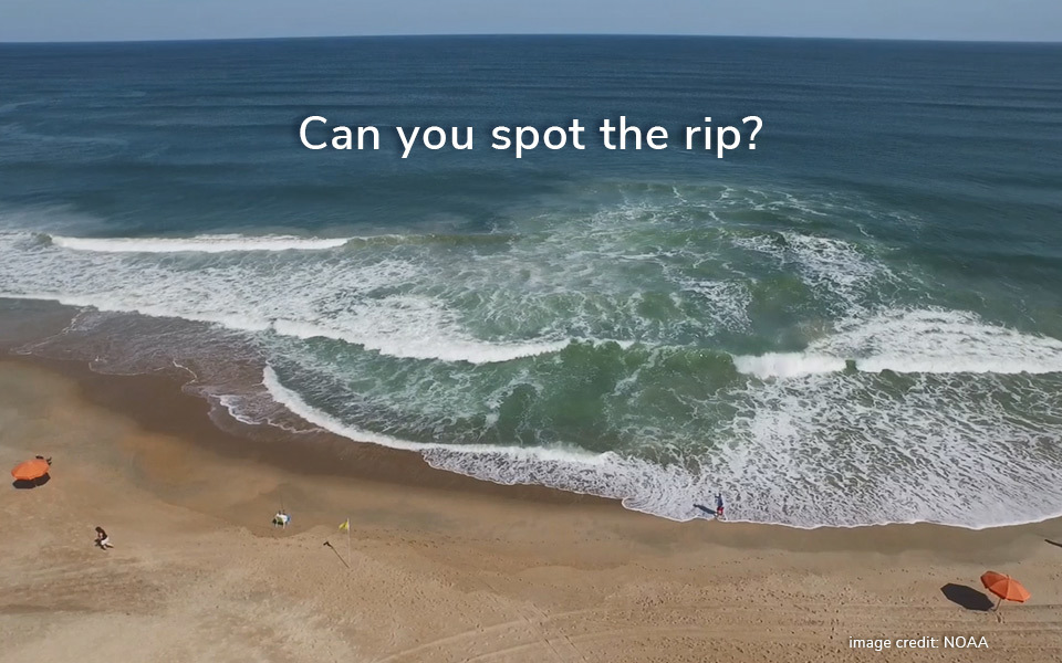 Drone view of waves just off a Hatteras Island beach showing a rip current. Text over the image says, "Can you spot the rip?"