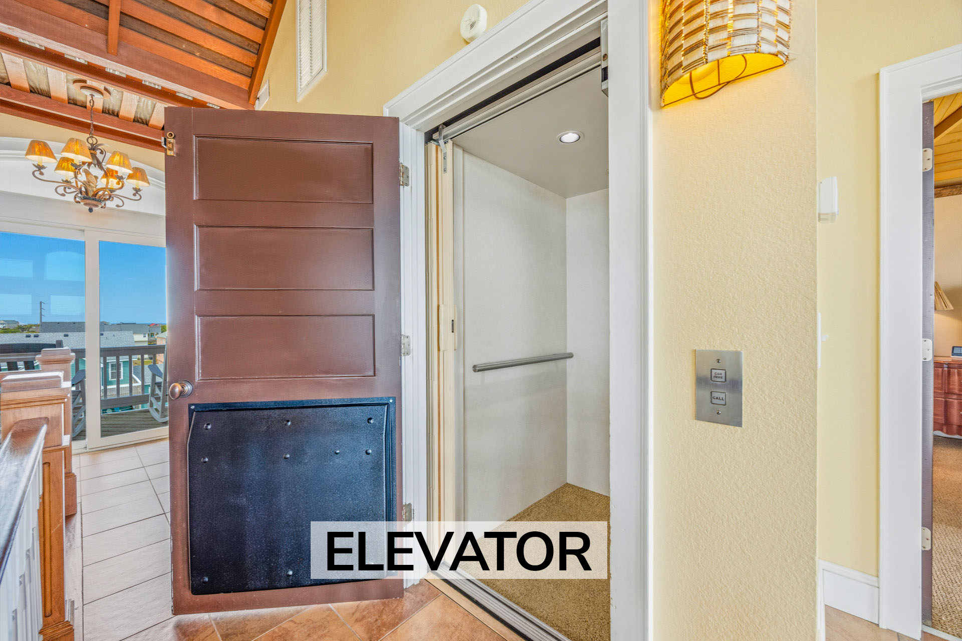 Surf Or Sound Realty 957 Coral Breeze Elevator Label