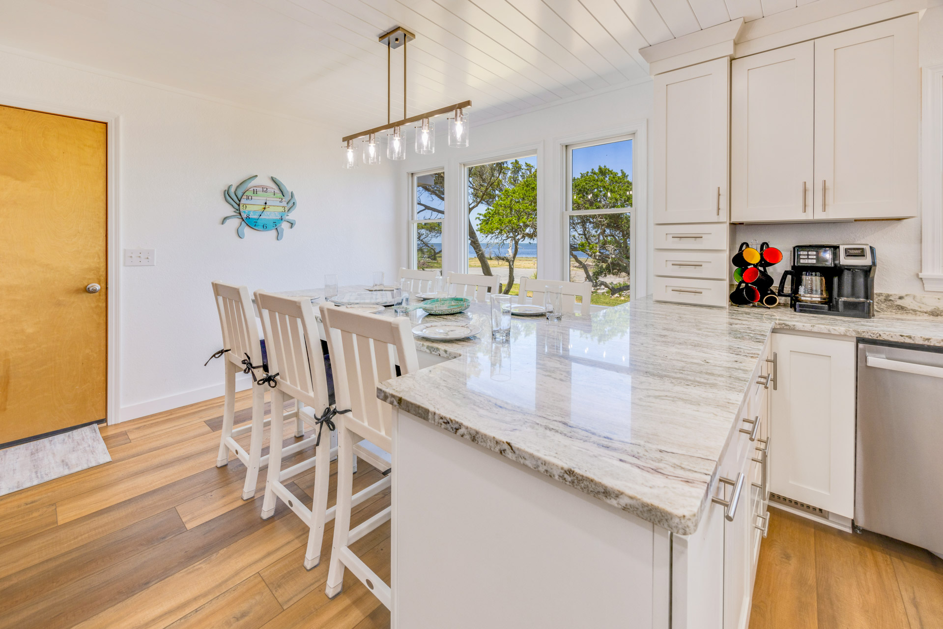 Surf Or Sound Realty 905 Paradise Point Dining Area 1